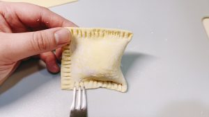 Seal the side by crimping with a fork